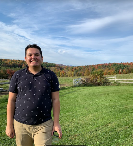 Smiling man outdoors.